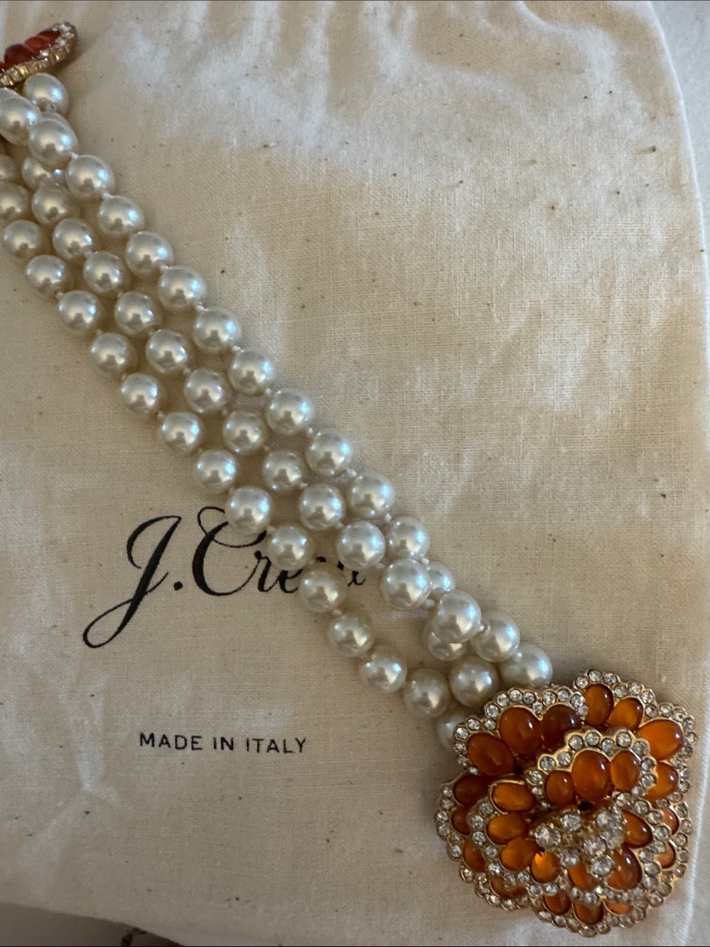 J. Crew White Pearl Triple-Strand Necklace with Amber Flower Clasp